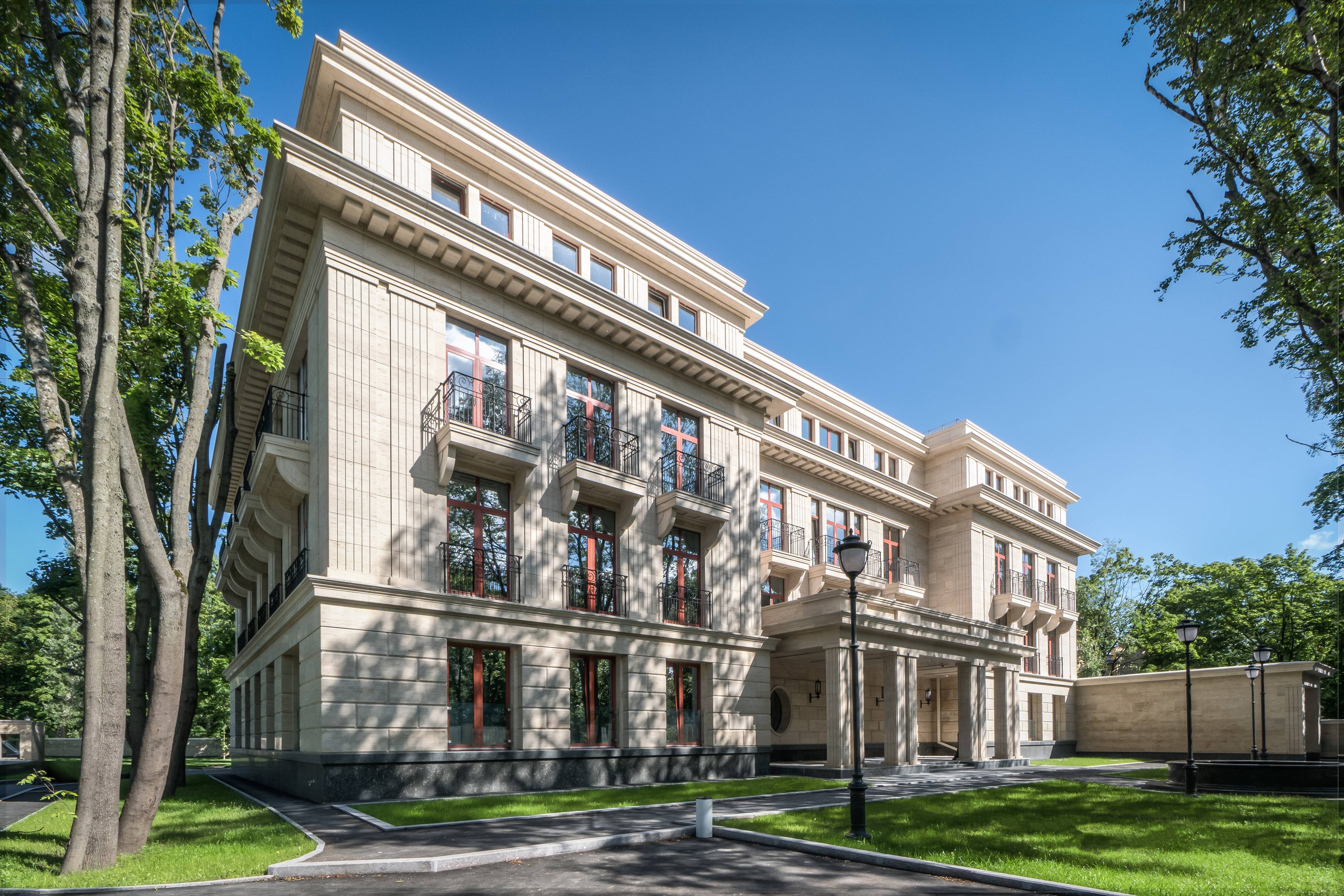 Облицовка фасада известняком Отделка фасада известняком